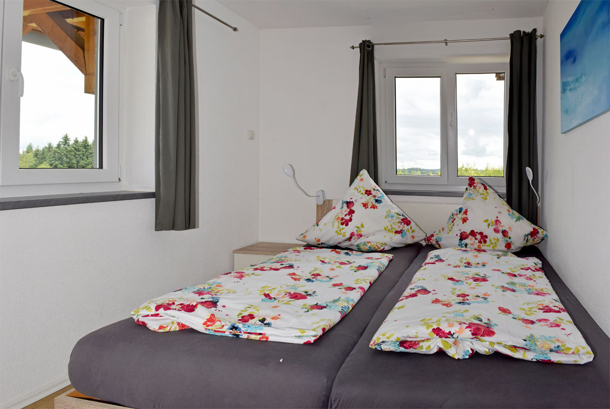 Schlafzimmer mit Doppelbett