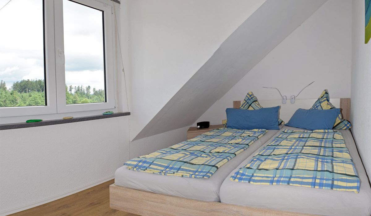 Schlafzimmer mit Doppelbett